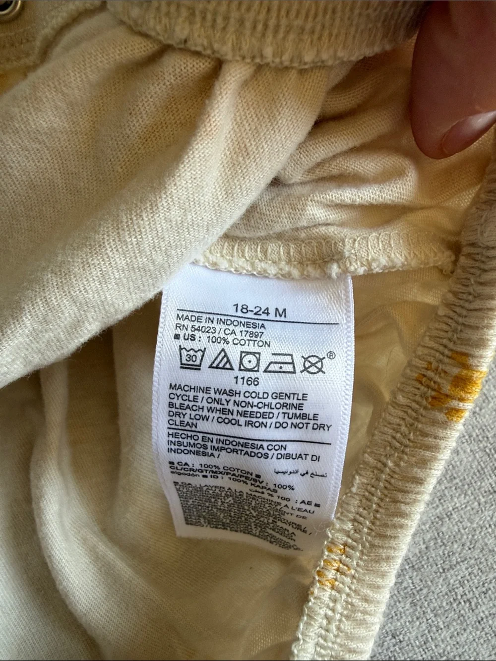 Old Navy Cream Baby Romper with Yellow Sun Print